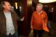 AUSTIN, TX - DECEMBER 15: University of Texas head football coach Mack Brown (R) gets an invitation from Texas basketball coach Rick Barnes to come to more UT basketball games December 15, 2013 in Austin, Texas. Brown announced that he will step down as c