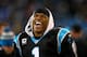 CHARLOTTE, NC - DECEMBER 15: Cam Newton #1 of the Carolina Panthers reacts on the bench during their game against the New York Jets at Bank of America Stadium on December 15, 2013 in Charlotte, North Carolina. (Photo by Streeter Lecka/Getty Images)