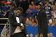 Oct 4, 2013; Lawrence, KS, USA; Kansas Jayhawks guard Andrew Wiggins (left) and center Joel Embiid perform a skit before scrimmage during Late Night at Allen Fieldhouse. Mandatory Credit: Denny Medley-USA TODAY Sports