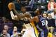 Roy Hibert backs down Charlotte's Al Jefferson during Indiana's 99-94 victory over the Charlotte Bobcats on December 13.