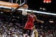 Dec 16, 2013; Miami, FL, USA; Miami Heat small forward LeBron James (6) dunks the ball as Utah Jazz point guard Trey Burke (3) looks on in the first half at American Airlines Arena. Mandatory Credit: Robert Mayer-USA TODAY Sports