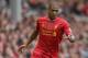 LIVERPOOL, ENGLAND - AUGUST 17: Glen Johnson of Liverpool in action during the Barclays Premier League match between Liverpool and Stoke City at Anfield on August 17, 2013 in Liverpool, England. (Photo by Clive Brunskill/Getty Images)