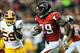 Dec 15, 2013; Atlanta, GA, USA; Atlanta Falcons running back Steven Jackson (39) runs the ball in the first half against the Washington Redskins at the Georgia Dome. Mandatory Credit: Daniel Shirey-USA TODAY Sports