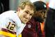 ATLANTA, GA - DECEMBER 15: Kirk Cousins #12 of the Washington Redskins chats with Robert Griffin III after throwing a 4th quarter interception against the Atlanta Falcons at the Georgia Dome on December 15, 2013 in Atlanta, Georgia. (Photo by Scott Cunnin