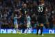 MANCHESTER, ENGLAND - NOVEMBER 24: Younes Kaboul and Michael Dawson of Tottenham Hotspur look on dejected as Manchester City celebrate after the Barclays Premier League match between Manchester City and Tottenham Hotspur at Etihad Stadium on November 24,