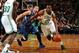 BOSTON, MA - DECEMBER 16: Jordan Crawford #27 of the Boston Celtics drives to the basket against Jose Barea #11 of the Minnesota Timberwolves on December 16, 2013 at the TD Garden in Boston, Massachusetts. NOTE TO USER: User expressly acknowledges and ag
