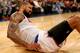 NEW YORK, NY - NOVEMBER 05: Tyson Chandler #6 of the New York Knicks struggles to get up after colliding with Kemba Walker #15 of the Charlotte Bobcats in the first quarter at Madison Square Garden on November 5, 2013 in New York City.NOTE TO USER: User