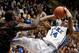 Dec 16, 2013; Durham, NC, USA; Gardner Webb Runnin Bulldogs forward Donta Harper (0) defends as Duke Blue Devils guard Rasheed Sulaimon (14) gets off a shot at Cameron Indoor Stadium. Mandatory Credit: Mark Dolejs-USA TODAY Sports