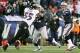Jan 20, 2013; Foxboro, MA, USA; New England Patriots quarterback Tom Brady (12) drops back to pass as center Ryan Wendell (62) blocks Baltimore Ravens outside linebacker Terrell Suggs (55) in the first quarter of the AFC championship game at Gillette Stad