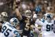 NEW ORLEANS, LA - DECEMBER 8: Drew Brees #9 of the New Orleans Saints throws a pass during a game against the Carolina Panthers at Mercedes-Benz Superdome on December 8, 2013 in New Orleans, Louisiana. The Saints defeated the Panthers 31-13. (Photo by