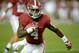 Nov 9, 2013; Tuscaloosa, AL, USA; Alabama Crimson Tide running back T.J. Yeldon (4) carries the ball for a four ear touchdown during the third quarter against the LSU Tigers at Bryant-Denny Stadium. Mandatory Credit: John David Mercer-USA TODAY Sports