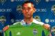 SEATTLE, WA - AUGUST 05: Former U.S. National Team Captain Clint Dempsey holds up his new jersey during a press conference announcing his signing with the Seattle Sounders FC at CenturyLink Field on August 5, 2013 in Seattle, Washington. (Photo by Otto