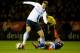 LEICESTER, ENGLAND - DECEMBER 17: Edin Dzeko of Manchester City is tackled by Anthony Knockaert of Leicester City during the Capital One Cup Quarter-Final match between Leicester City and Manchester City at The King Power Stadium on December 17, 2013 in