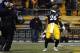 PITTSBURGH, PA - DECEMBER 15: Le'Veon Bell #26 of the Pittsburgh Steelers celebrates after rushing for a 1 yard touchdown in the first half against the Cincinnati Bengals during the game on December 15, 2013 at Heinz Field in Pittsburgh, Pennsylvania. (