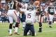 CLEVELAND, OH - DECEMBER 15: Wide receiver Brandon Marshall #15 of the Chicago Bears signals touchdown after catching a touchdown pass during the final minute of the first half at against the Cleveland Browns FirstEnergy Stadium on December 15, 2013 in Cl