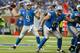 DETROIT, MI - DECEMBER 16: Quarterback Matthew Stafford #9 of the Detroit Lions passes down field during the second half against the Baltimore Ravens at Ford Field on December 16, 2013 in Detroit, Michigan. The Ravens defeated the Lions 18-16. (Photo by J