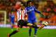 SUNDERLAND, ENGLAND - DECEMBER 17: Ondrej Celustka of Sunderland controls the ball under pressure from Willian of Chelsea during the Capital One Cup Quarter-Final match between Sunderland and Chelsea at Stadium of Light on December 17, 2013 in Sunderlan