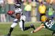 GREEN BAY, WI - NOVEMBER 10: LeSean McCoy #25 of the Philadelphia Eagles gets around Clay Matthews #52 of the Green Bay Packers during a first quarter run at Lambeau Field on November 10, 2013 in Green Bay, Wisconsin. (Photo by Gregory Shamus/Getty Images