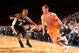 NEW YORK, NY - NOVEMBER 10: Beno Udrih #18 of the New York Knicks drives against Patty Mills #8 of the San Antonio Spurs during a game at the newly transformed Madison Square Garden in New York City on November 10, 2013. NOTE TO USER: User expressly ackn