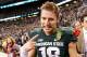 INDIANAPOLIS, IN - DECEMBER 07: Connor Cook #18 of the Michigan State Spartans celebrates a 34-24 win over the Ohio State Buckeyes at the Big 10 Conference Championship Game at Lucas Oil Stadium on December 7, 2013 in Indianapolis, Indiana. (Photo by Gre