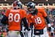 DENVER, CO - DECEMBER 8: Tight end Julius Thomas #80 of the Denver Broncos celebrates a second quarter touchdown against the Tennessee Titans with Peyton Manning #18 at Sports Authority Field Field at Mile High on December 8, 2013 in Denver, Colorado. (