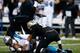NEW ORLEANS, LA - DECEMBER 08: Cam Newton #1 of the Carolina Panthers is sacked by Junior Galette #93 of the New Orleans Saints at Mercedes-Benz Superdome on December 8, 2013 in New Orleans, Louisiana. (Photo by Chris Graythen/Getty Images)
