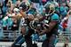 Dec 15, 2013; Jacksonville, FL, USA; Jacksonville Jaguars wide receiver Ace Sanders (18) celebrates with wide receiver Denard Robinson (16) and wide receiver Mike Brown (12) after a touchdown during the first half at EverBank Field. Mandatory Credit: Meli