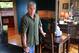 Norman Frink , a district attorney, was hounded by two dozen reporters when he went out for coffee.