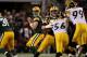 ARLINGTON, TX - FEBRUARY 06: Aaron Rodgers #12 of the Green Bay Packers drops back against the Pittsburgh Steelers during the first quarter of Super Bowl XLV at Cowboys Stadium on February 6, 2011 in Arlington, Texas. (Photo by Doug Pensinger/Getty Imag