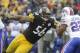PITTSBURGH, PA - NOVEMBER 10: LaMarr Woodley #56 of the Pittsburgh Steelers stretches to tackle Fred Jackson #22 of the Buffalo Bills during the second quarter at Heinz Field on November 10, 2013 in Pittsburgh, Pennsylvania. (Photo by Vincent Pugliese/Get