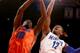 NEW YORK, NY - DECEMBER 17: Dorian Finney-Smith #10 of the Florida Gators and David Pellom #12 of the Memphis Tigers fight for the rebound during the Jimmy V Classic at Madison Square Garden on December 17, 2013 in New York City. (Photo by Elsa/Getty Im