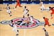 Dec 17, 2013; New York, NY, USA; Memphis Tigers guard Geron Johnson (55) brings the ball across the half-court Jimmy V. logo against the Florida Gators during the first half of the second game of the Jimmy V. Classic at Madison Square Garden. Mandatory Cr
