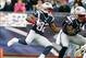 Dec 8, 2013; Foxborough, MA, USA; New England Patriots wide receiver Josh Boyce (82) runs back a kick off against the Cleveland Browns during the second quarter at Gillette Stadium. Mandatory Credit: Stew Milne-USA TODAY Sports