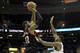 Dec 17, 2013; Cleveland, OH, USA; Portland Trail Blazers power forward LaMarcus Aldridge (12) shoots over Cleveland Cavaliers power forward Tristan Thompson (13) in the first quarter at Quicken Loans Arena. Mandatory Credit: David Richard-USA TODAY Sports