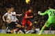 LONDON, ENGLAND - DECEMBER 15: Luis Suarez of Liverpool scores their fourth goal during the Barclays Premier League match between Tottenham Hotspur and Liverpool at White Hart Lane on December 15, 2013 in London, England. (Photo by Paul Gilham/Getty Imag