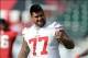 Oct 25, 2013; London, United Kingdom, USA; San Francisco 49ers guard Mike Iupati (77) at practice at Allianz Park Stadium in advance of the NFL International Series game against the Jacksonville Jaguars. Mandatory Credit: Kirby Lee-USA TODAY Sports