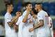 FARO, PORTUGAL - JULY 27: Konstantinos Mitroglou (R) of Olympiacos celebrates with his team-mates after scoring during a pre-Season friendly match between Newcastle United and Olympiacos on July 27, 2012 in Faro, Portugal. (Photo by Valerio Pennicino/Gett