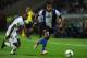 PORTO, PORTUGAL - AUGUST 25: Alex Sandro (R) of FC Porto runs of Ricardo of Vitoria Guimaraes during the Liga Zon Sagres match between FC Porto and Vitoria Guimaraes at Estadio do Dragao on August 25, 2012 in Porto, Portugal. (Photo by Valerio Pennicino