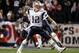 BUFFALO, NY - NOVEMBER 18: Tom Brady #12 of the New England Patriots reacts after Lawrence Maroney #39 scored New England's first touchdown against the Buffalo Bills at Ralph Wilson Stadium November 18, 2007 in Orchard Park, New York. The Patriots won 56
