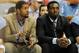 Nov 17, 2013; Chapel Hill, NC, USA; North Carolina Tar Heels guard Leslie McDonald (2) and guard P.J. Hairston (15) sit on the sideline during the second half of their loss to the Belmont Bruins at Dean E. Smith Student Activities Center. Belmont won 83-8