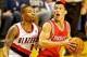 Nov 5, 2013; Portland, OR, USA; Houston Rockets point guard Jeremy Lin (7) drives to the basket past Portland Trail Blazers point guard Damian Lillard (0) at the Moda Center. Mandatory Credit: Craig Mitchelldyer-USA TODAY Sports