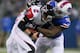 TORONTO, ON - DECEMBER 01: Matt Ryan #2 of the Atlanta Falcons is sacked by Corbin Bryant #97 of the Buffalo Bills at Rogers Centre on December 1, 2013 in Toronto, Ontario.Atlanta won 34-31 in overtime. (Photo by Rick Stewart/Getty Images)