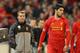 MELBOURNE, AUSTRALIA - JULY 24: Liverpool FC Manager Brendan Rodgers (L) looks on as Luis Suarez of Liverpool is substituted into the match during the match between the Melbourne Victory and Liverpool at the Melbourne Cricket Ground on July 24, 2013 in M