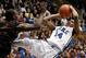 Dec 16, 2013; Durham, NC, USA; Gardner Webb Runnin Bulldogs forward Donta Harper (0) defends as Duke Blue Devils guard Rasheed Sulaimon (14) gets off a shot at Cameron Indoor Stadium. Mandatory Credit: Mark Dolejs-USA TODAY Sports