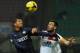 MILAN, ITALY - DECEMBER 04: Fredy Guarin (L) of FC Internazionale Milano competes with Antonino Dai of Trapani Calcio during the Tim Cup match between FC Internazionale Milano and Trapani Calcio at Stadio Giuseppe Meazza on December 4, 2013 in Milan, Ita