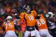 DENVER, CO - DECEMBER 12: Peyton Manning #18 of the Denver Broncos looks to pass against the San Diego Chargers in the second quarter at Sports Authority Field at Mile High on December 12, 2013 in Denver, Colorado. (Photo by Justin Edmonds/Getty Images)