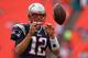 MIAMI GARDENS, FL - DECEMBER 15: Tom Brady #12 of the New England Patriots warms up during a game against the Miami Dolphins at Sun Life Stadium on December 15, 2013 in Miami Gardens, Florida. (Photo by Mike Ehrmann/Getty Images)