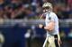 ST. LOUIS, MO - DECEMBER 15: Drew Brees #9 of the New Orleans Saints returns to the sidelines after throwing his second interception of the first quarter against the St. Louis Rams at the Edward Jones Dome on December 15, 2013 in St. Louis, Missouri. (Ph