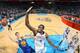 OKLAHOMA CITY, OK - NOVEMBER 29: Klay Thompson #11 of the Golden State Warriors shoots against Serge Ibaka #9 of the Oklahoma City Thunder on November 29, 2013 at the Chesapeake Energy Arena in Oklahoma City, Oklahoma. NOTE TO USER: User expressly acknow