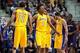 Nov 29, 2013; Auburn Hills, MI, USA; Los Angeles Lakers shooting guard Wesley Johnson (11) and small forward Nick Young (0) celebrate during the fourth quarter against the Detroit Pistons at The Palace of Auburn Hills. Lakers won 106-102. Mandatory Credit